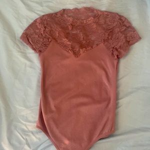 Light pink body suit